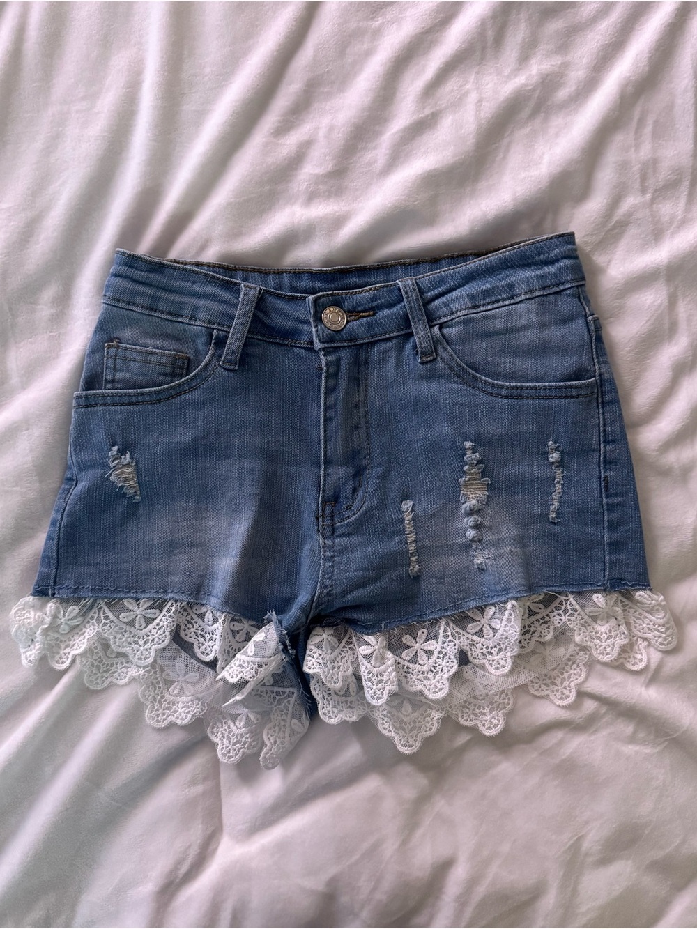 Distressed Denim Shorts with White Lace Trim